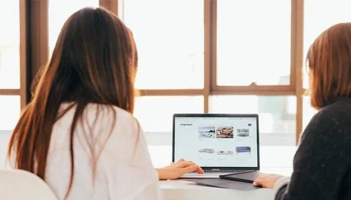 Women looking at laptop